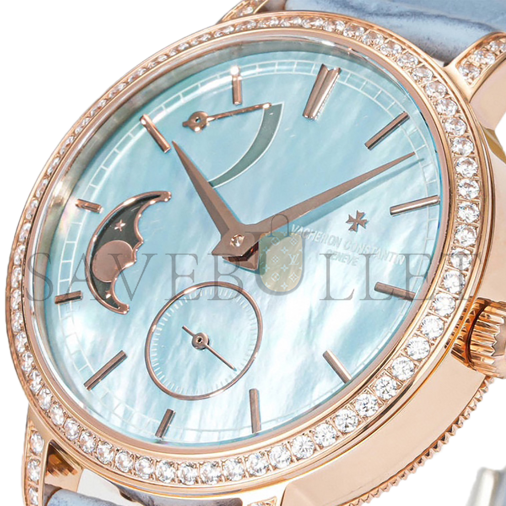 vacheron co*sta*t*n traditionelle moon phase blue mop dial with Di*m*nd bezel in pink gold on blue leather strap watch 83570/000r-9915